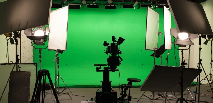 Shooting studio with professional equipment and green screen