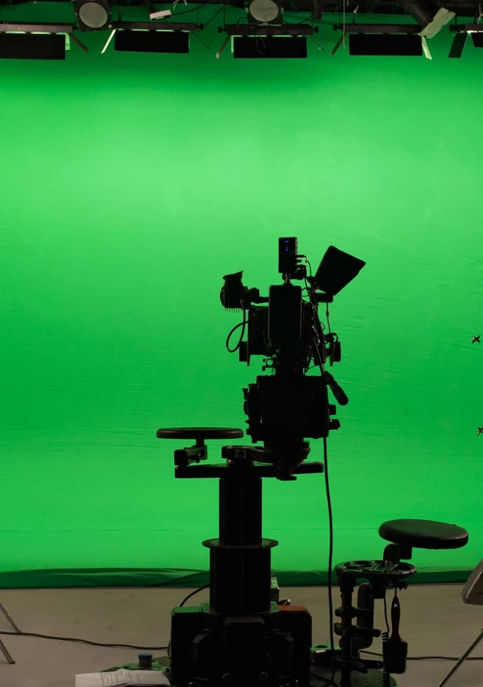 Shooting studio with professional equipment and green screen
